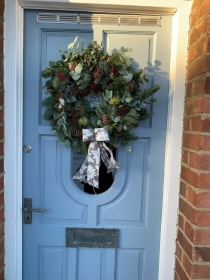 Mixed winter foliage door garland